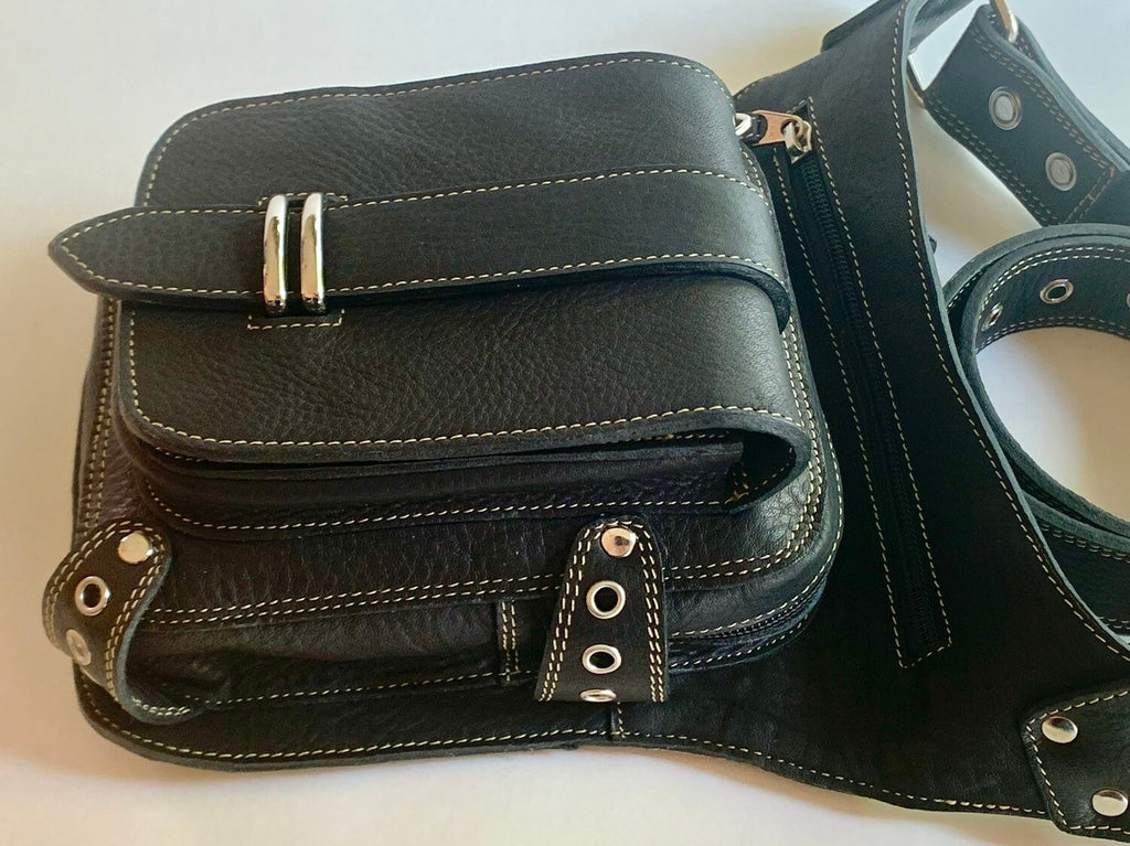Close up of a black leather belt bag 